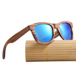 Vintage Natural Zebra Wood Sunglasses with blue lenses on bamboo roll