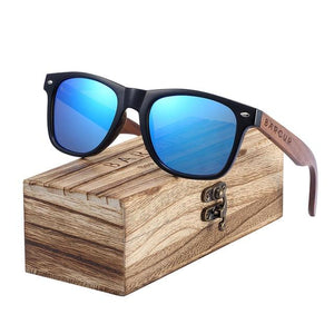 Black walnut sunglasses with blue lenses on top of high quality wooden case