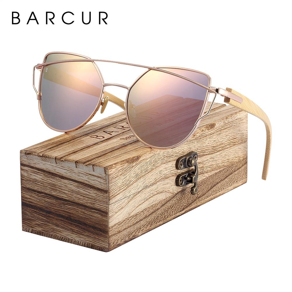 Pink cat eye sunglasses with bamboo arms and wooden case