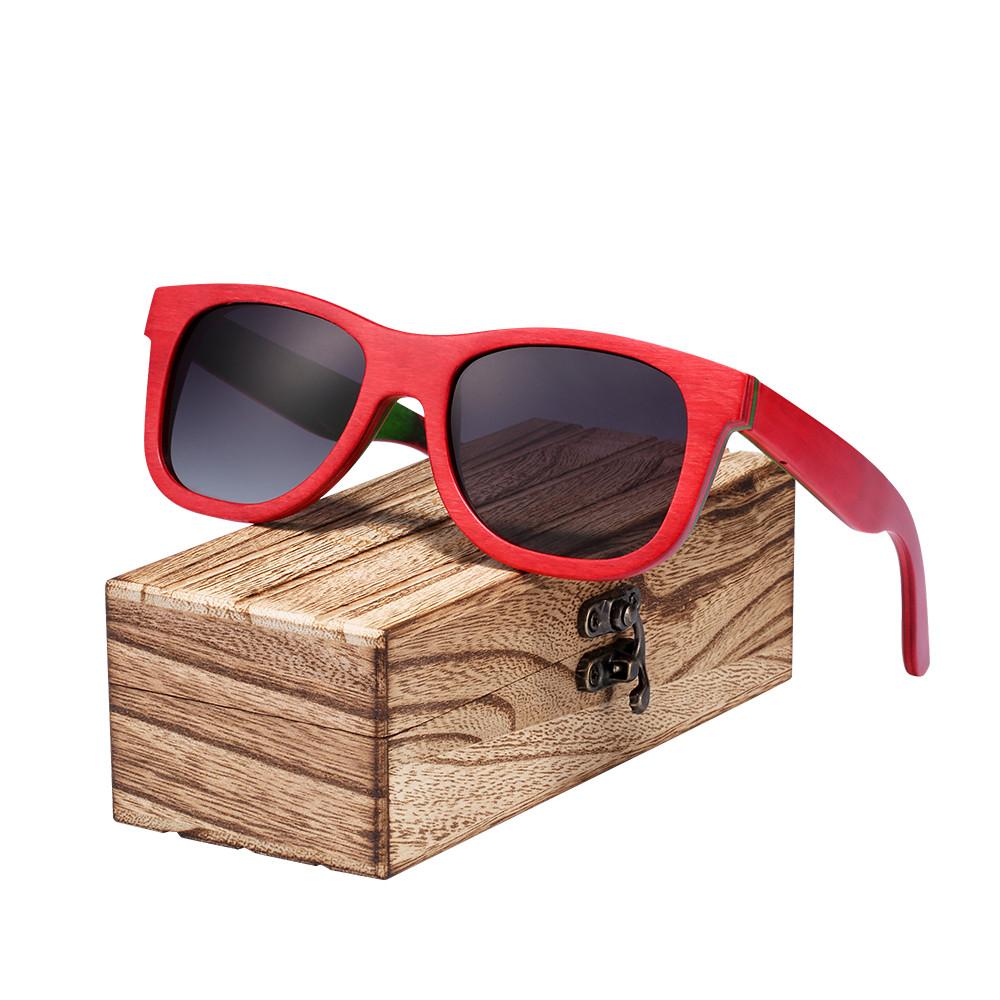 Red skateboard wood sunglasses on wooden box