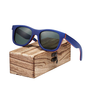 Blue skateboard wood sunglasses on wooden box